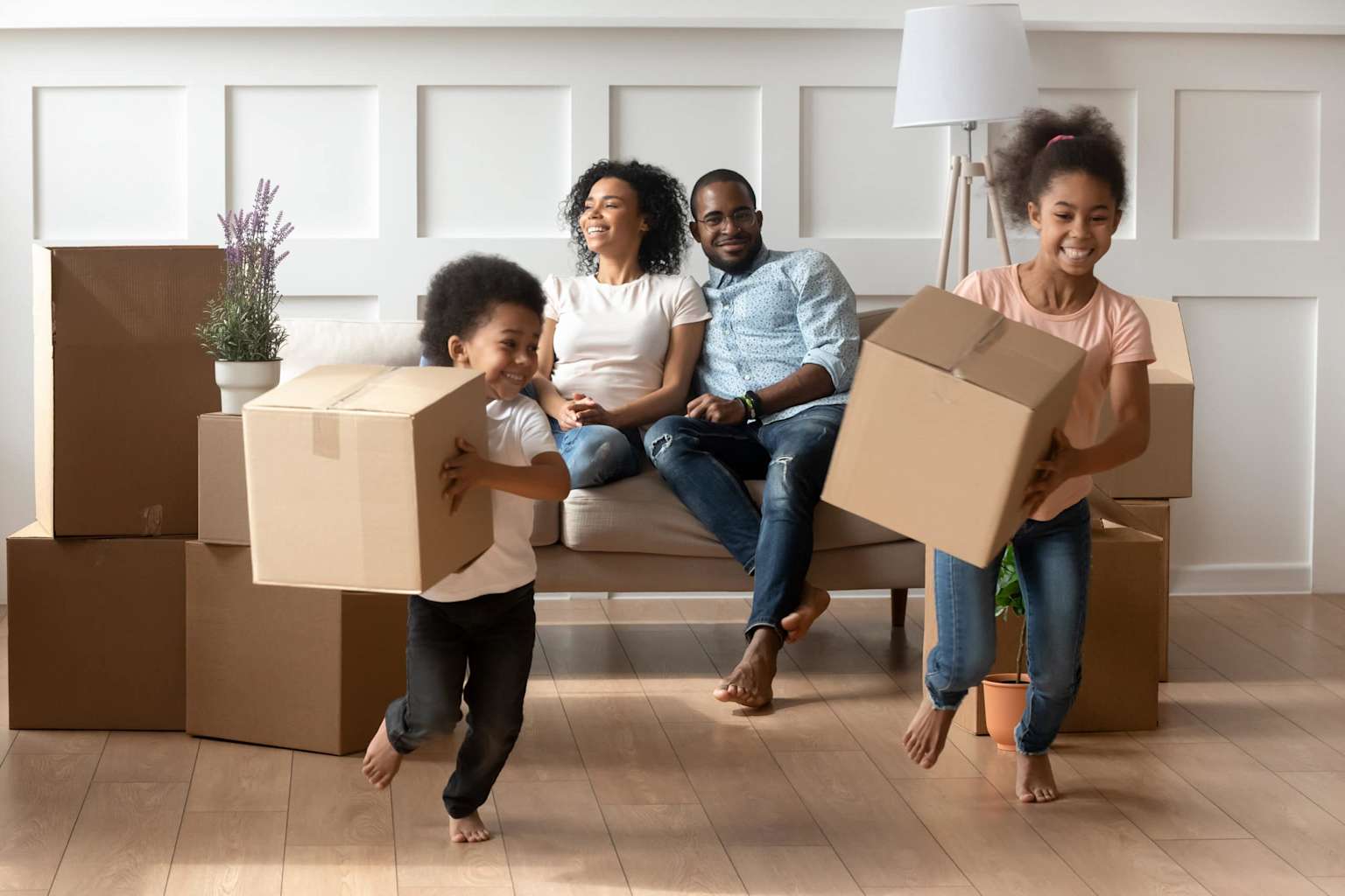 Family moving with boxes - Rent Property