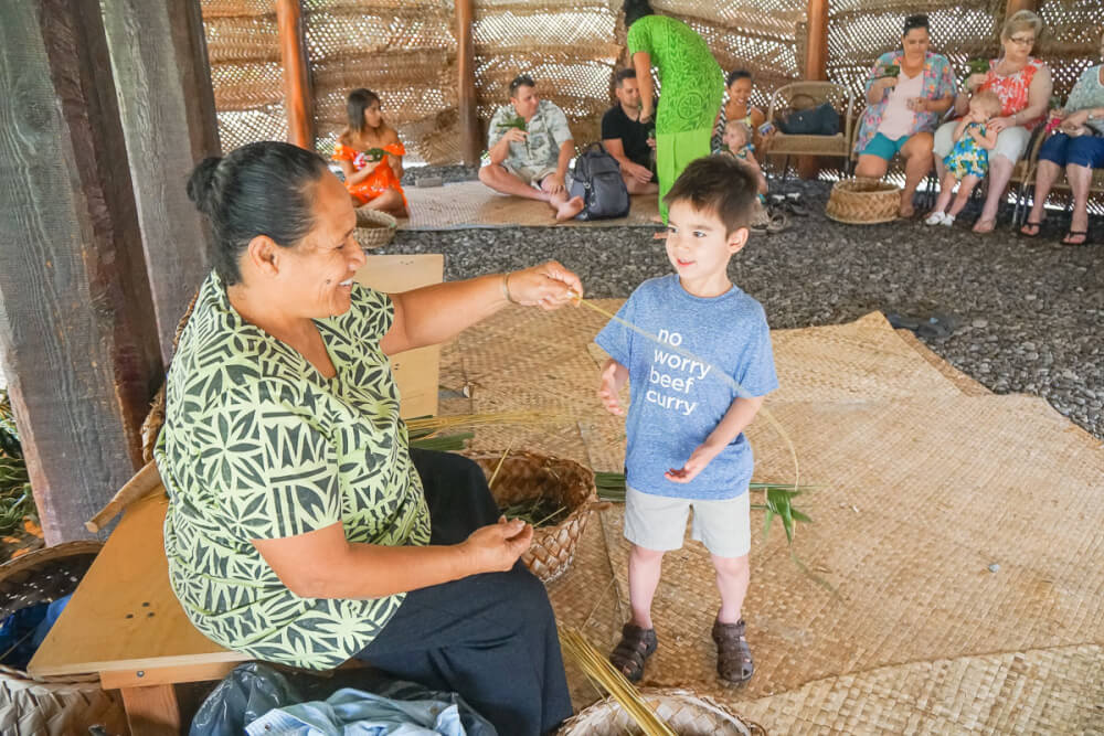 Demonstration of traditional weaving at the Polynesian Cultural Center, a family-friendly cultural activity suitable for all ages in Hawaii