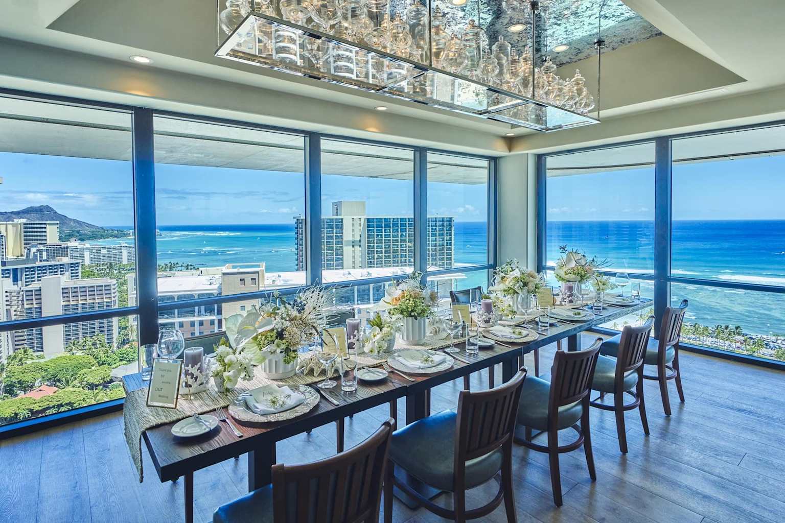 Empire Steak House Hawaii's elegant dining setup overlooking ocean views and Diamond Head from Ilikai Hotel