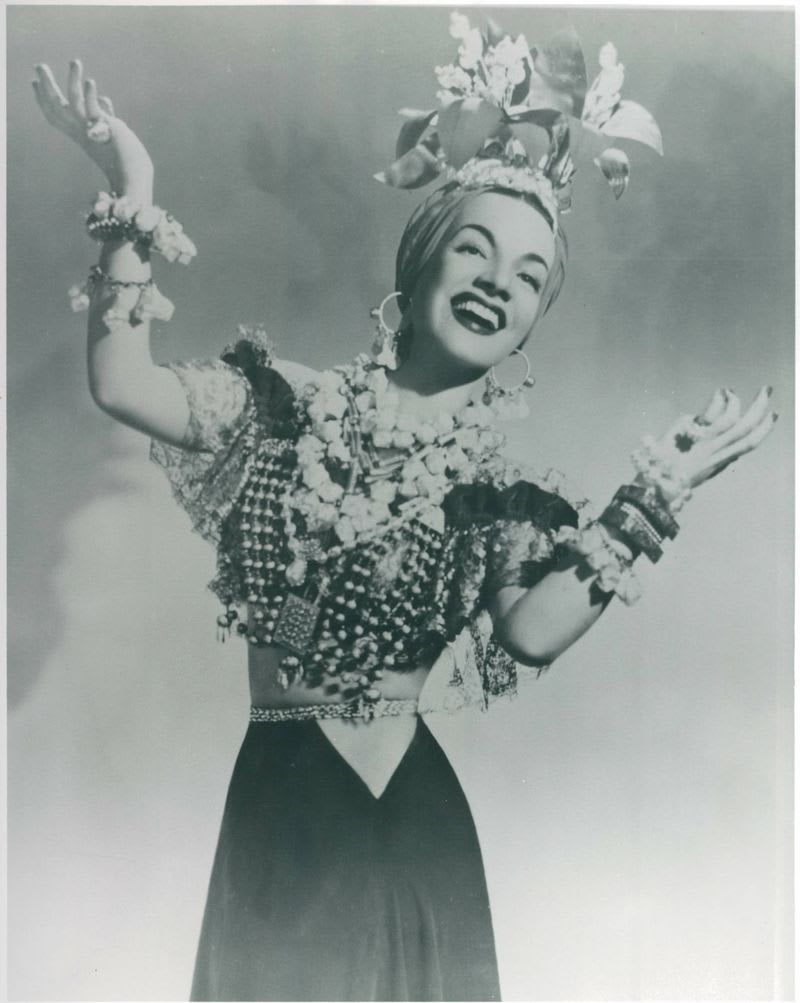 Carmen Miranda in traditional costume from the 1940s film Serenata Tropical, showcasing her iconic style and performance presence.