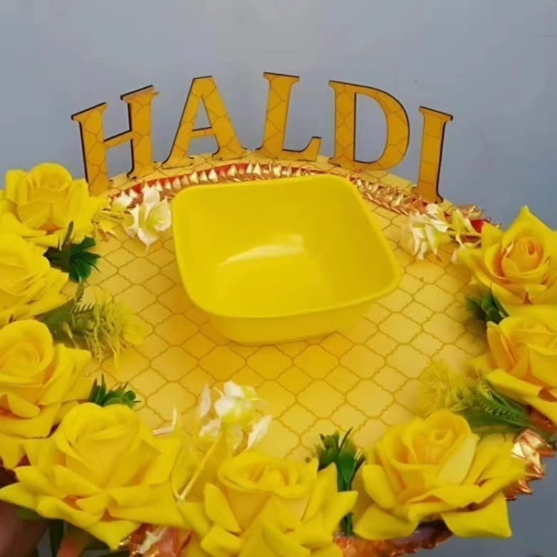 Haldi ceremony decoration with yellow flowers