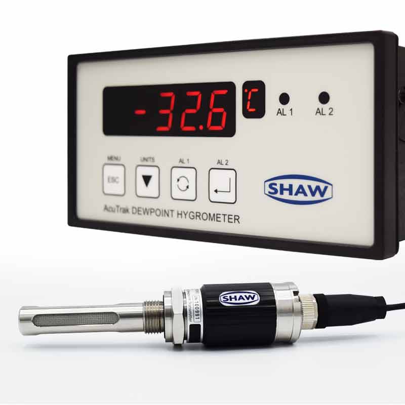 SHAW AcuTrak digital dew point hygrometer showing -32.6°C measurement and its sensor probe for compressed air moisture analysis