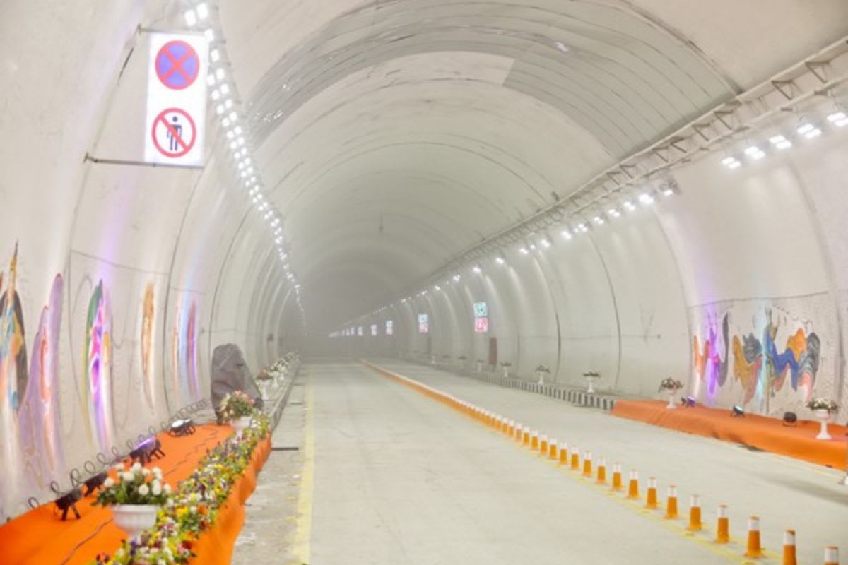 Inside view of the newly constructed Sevoke-Rangpo railway tunnel with decorative murals and safety markers