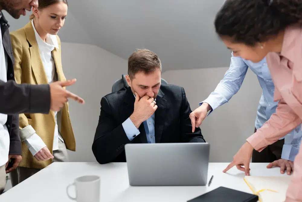Workplace conflict illustrating mentorship relationship mismatches and communication breakdown among colleagues