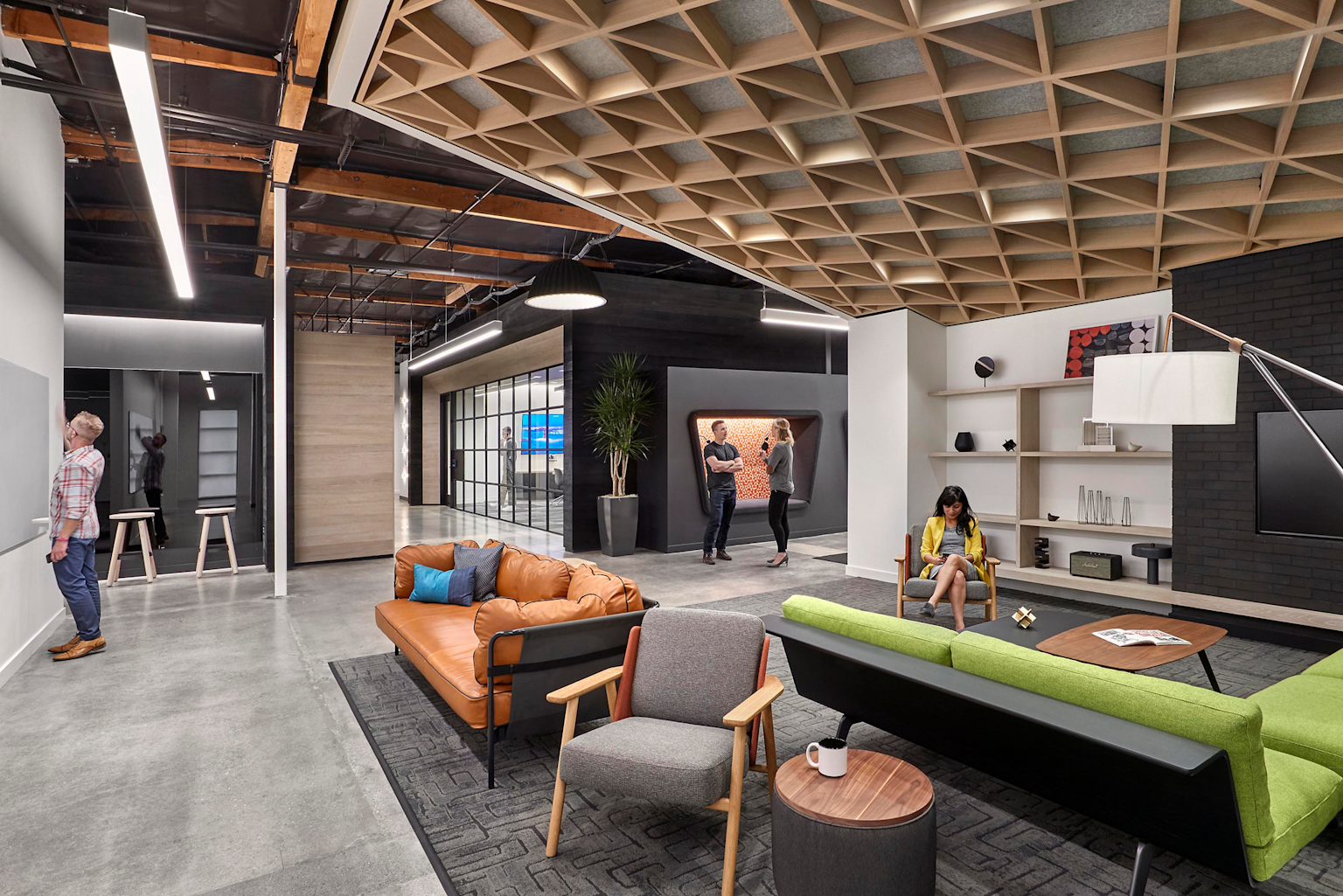 Modern Silicon Valley-style office interior with open workspace, contemporary furniture, and collaborative zones