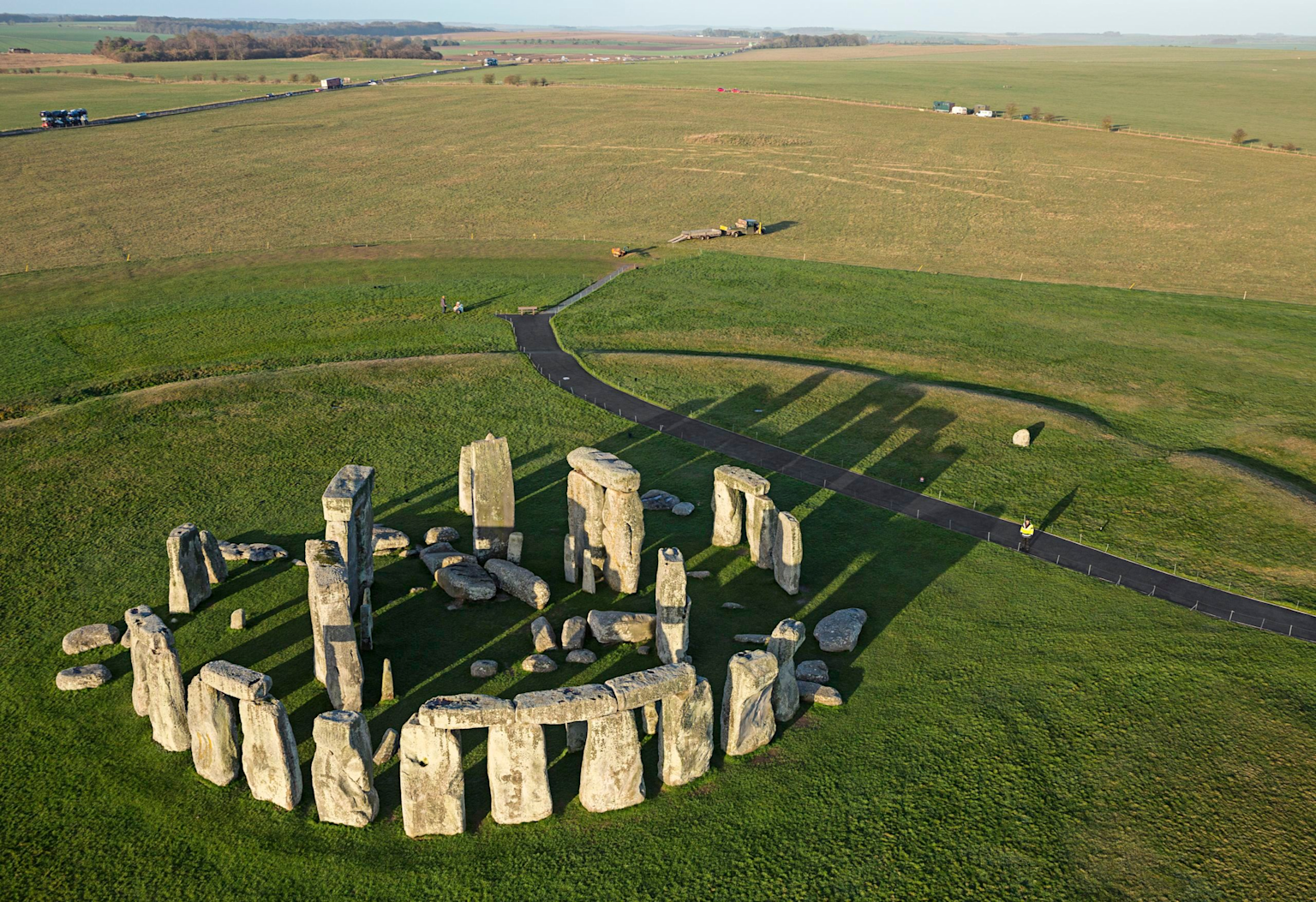 Aerial view of Stonehenge, showcasing prehistoric stone circle patterns on a grassy plain