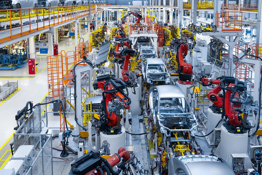 Robotic assembly line in a modern automotive factory illustrating advanced manufacturing automation