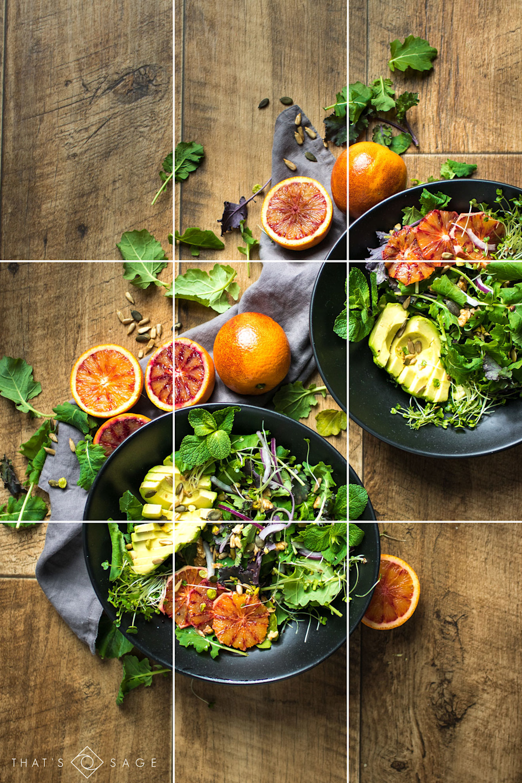 Example of food photography using the rule of thirds to create balanced composition with vibrant salads and citrus on a wooden background.