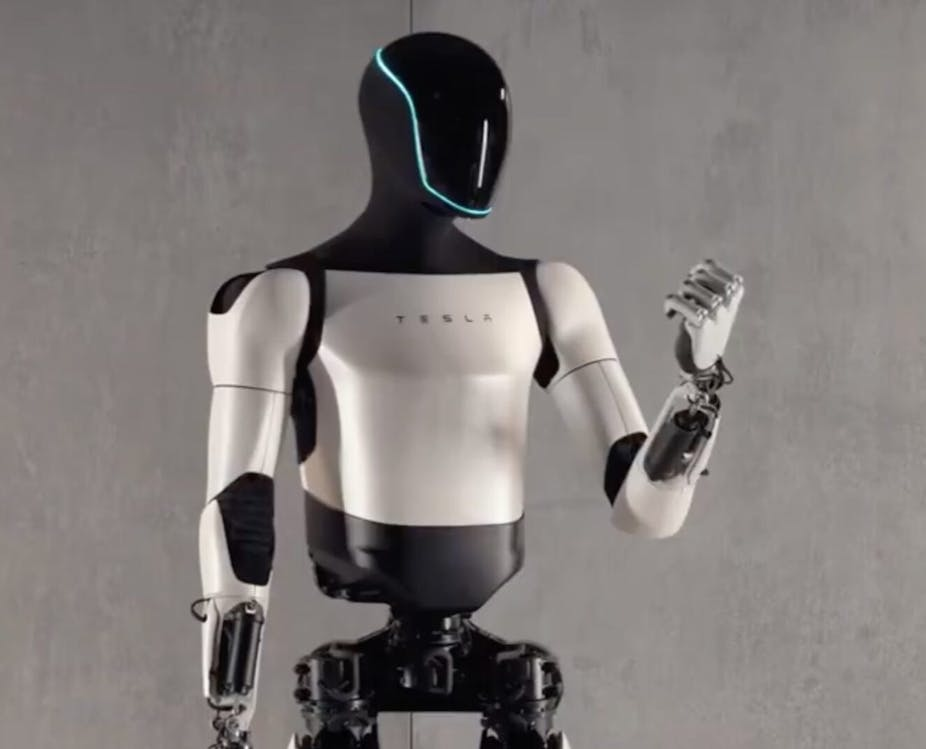 Tesla Optimus humanoid robot showcasing physical AI integration in a modern robotic design.