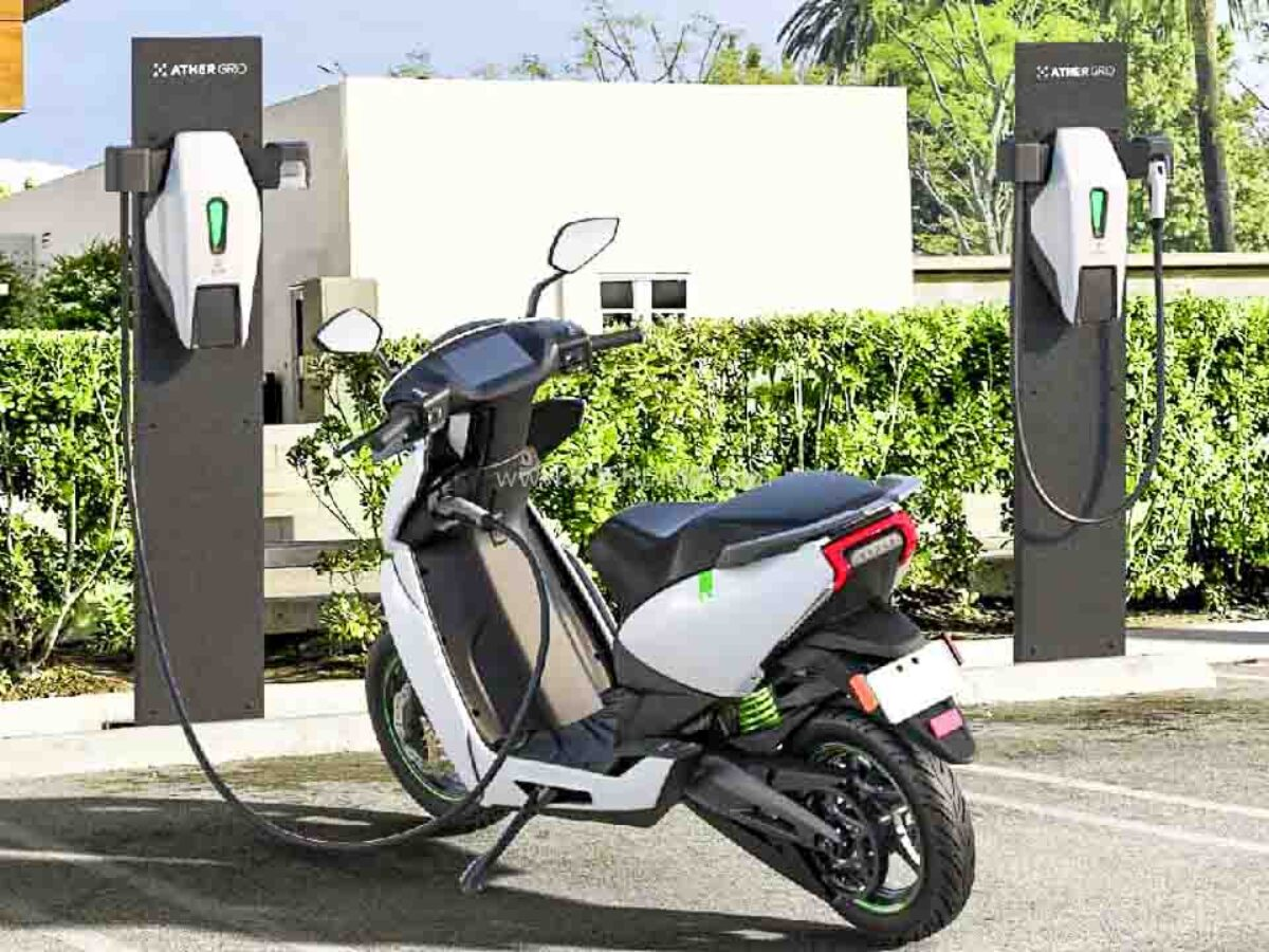 Modern electric scooter charging at Ather Grid public charging station showcasing EV infrastructure
