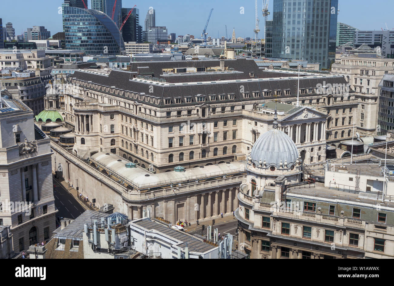 Aerial view of the Bank of England building and surrounding financial district in the City of London, highlighting the classical architecture amidst ongoing urban development