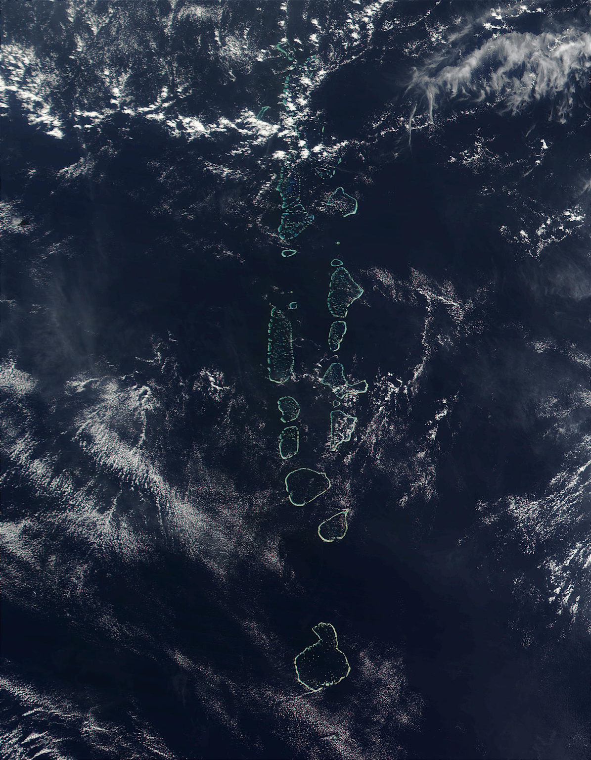 Satellite view of the Maldives atolls showing their scattered island formation in the Indian Ocean