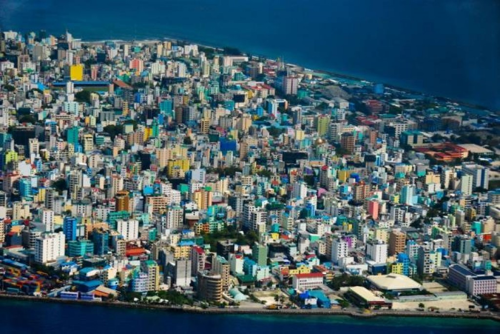 Aerial view of densely populated Malé city in the Maldives illustrating urban overcrowding on a small island