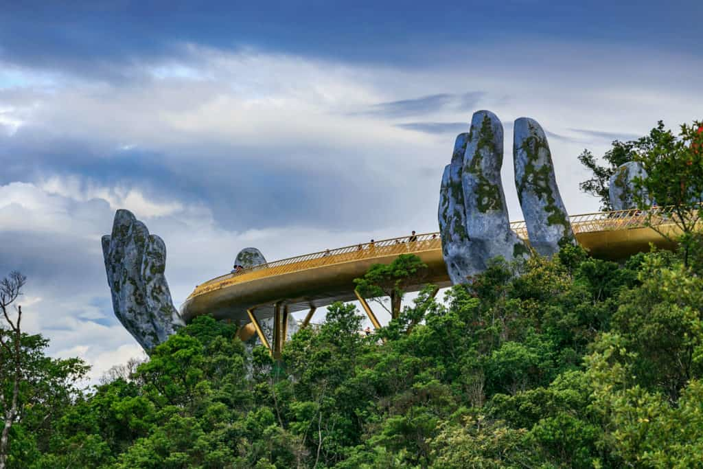 The Golden Bridge at Sun World Ba Na Hills, supported by giant stone hands