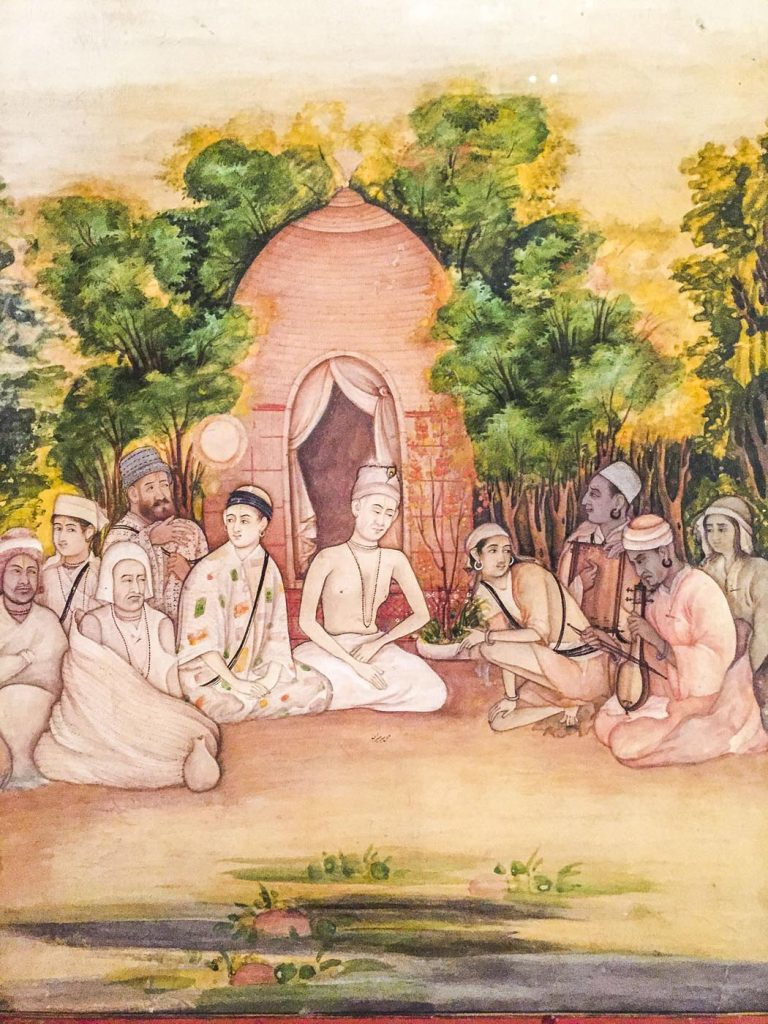 Medieval Indian saints and devotees engaged in a devotional gathering reflecting Bhakti movement traditions