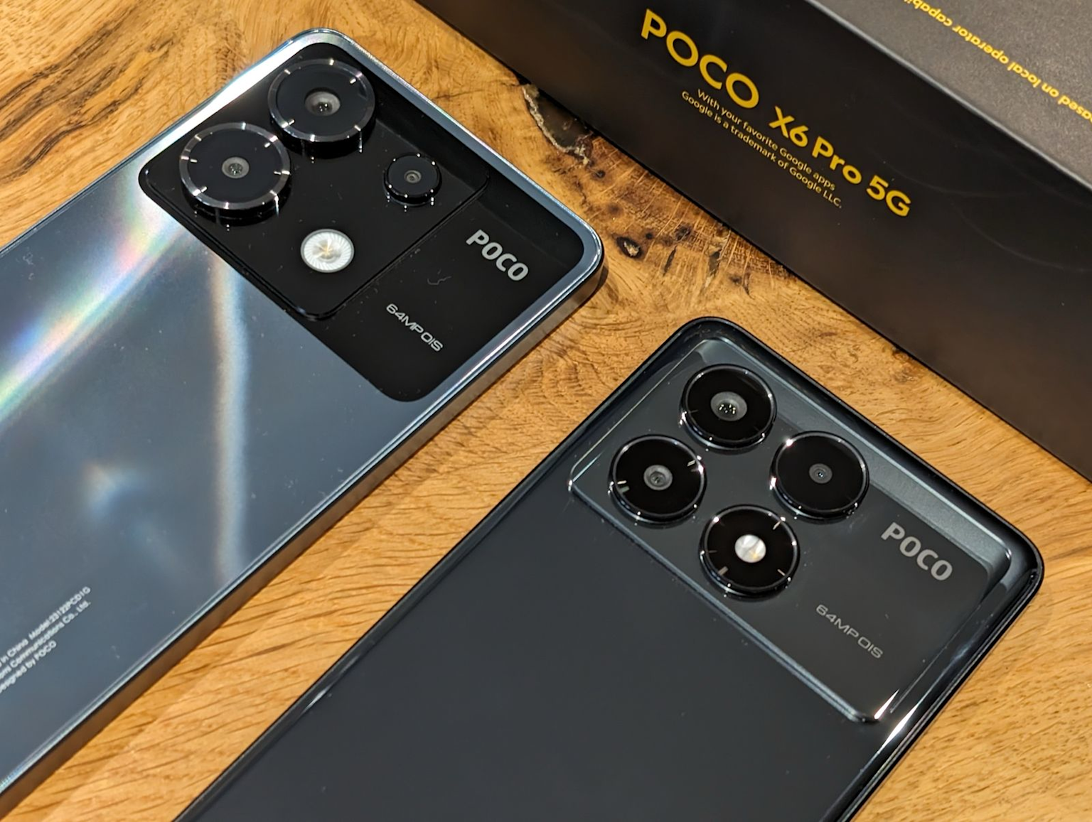 Close-up of Poco X6 Pro 5G smartphones showing rear cameras and branding