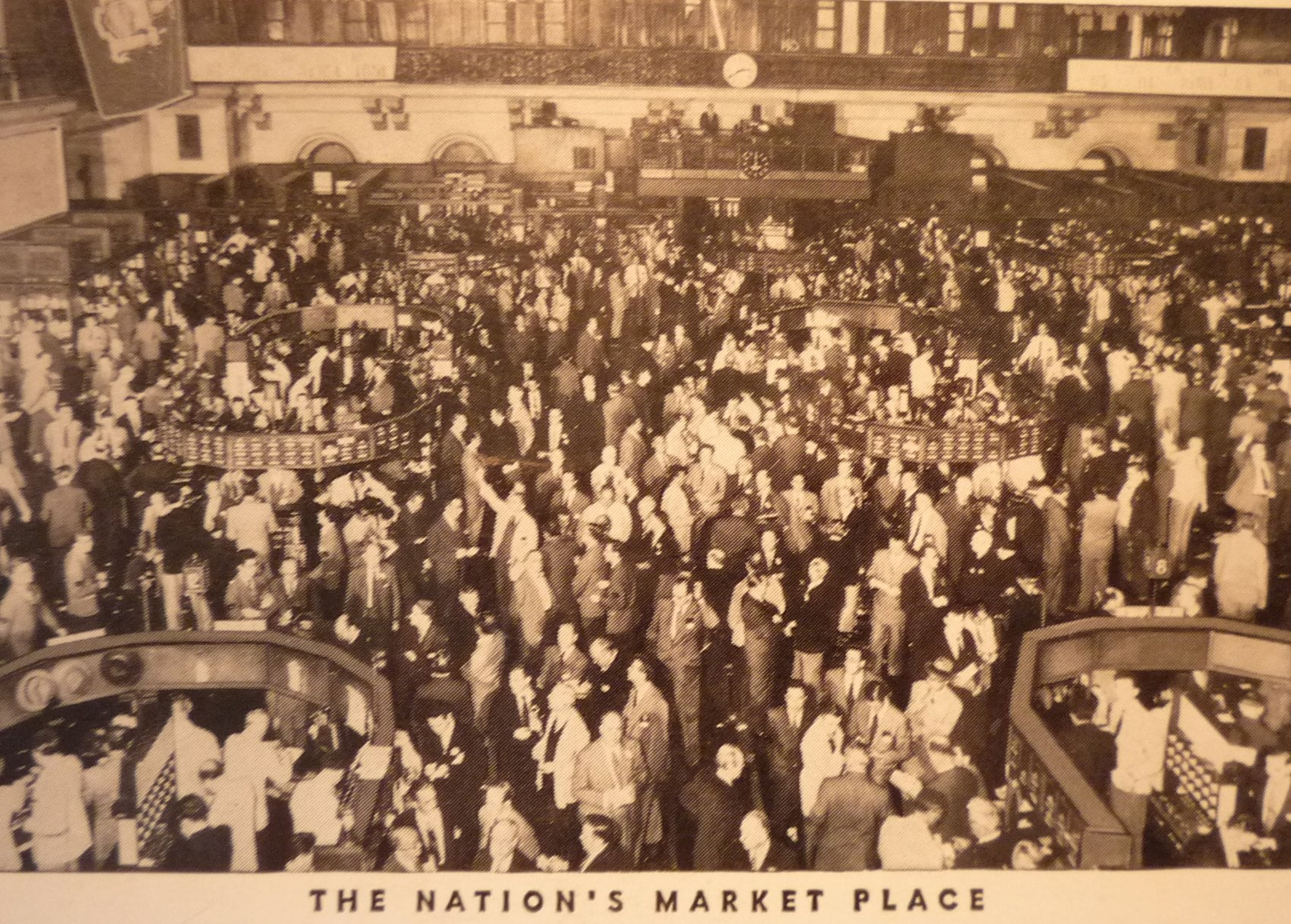 Historical trading floor of the New York Stock Exchange bustling with traders in the 1950s