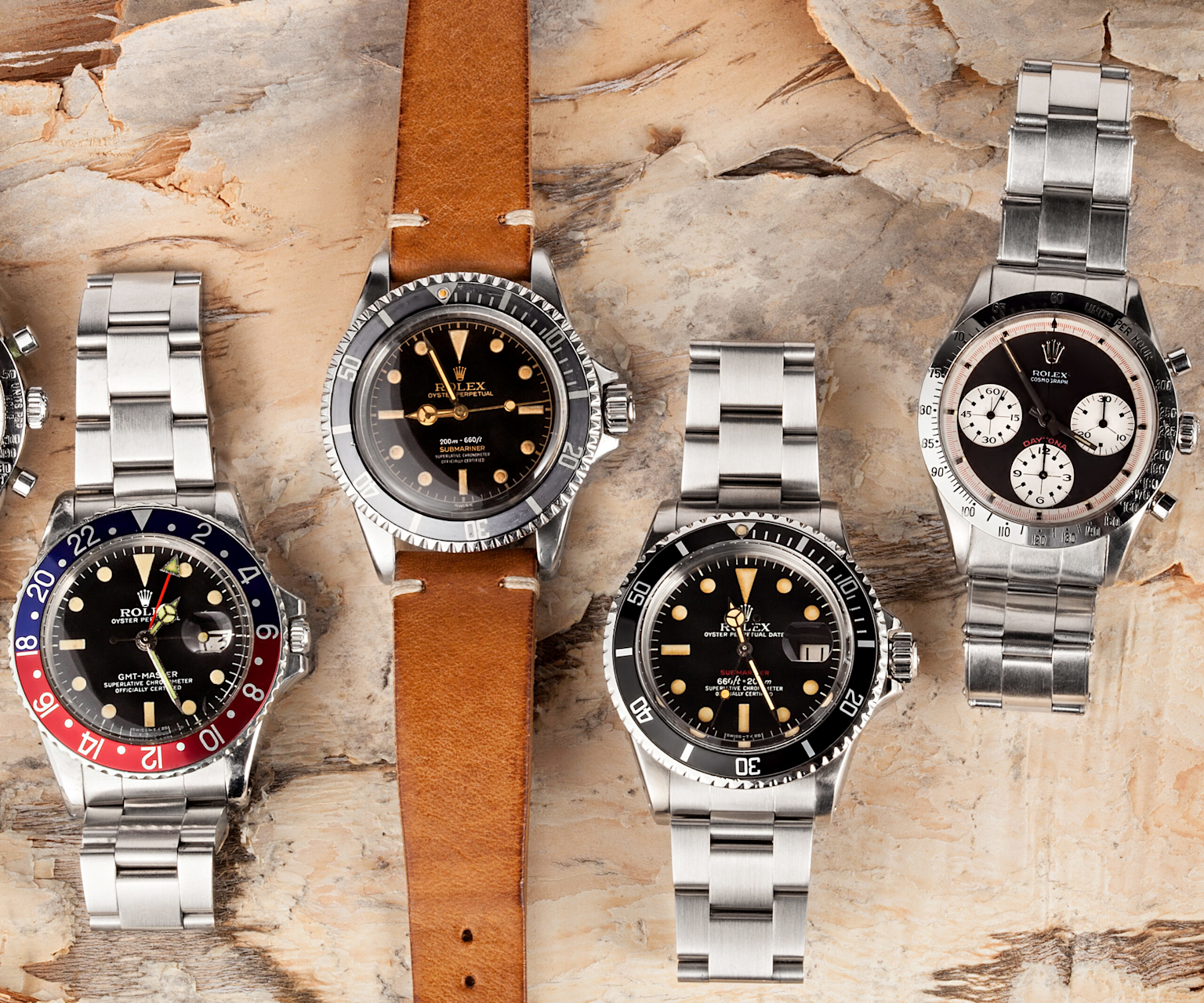 A curated collection of iconic Rolex watches including Submariner, GMT-Master, and Daytona models known for investment value and collector appeal