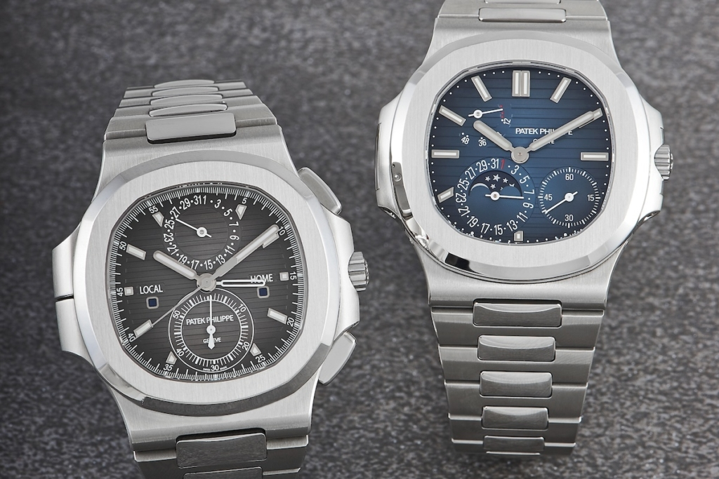 Close-up of two luxury Patek Philippe watches showcasing intricate design and craftsmanship