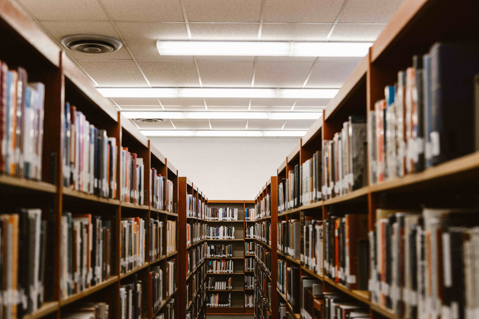 Rows of bookshelves in Siddharth College Library, reflecting a rich collection of books that symbolize Ambedkar's intellectual environment