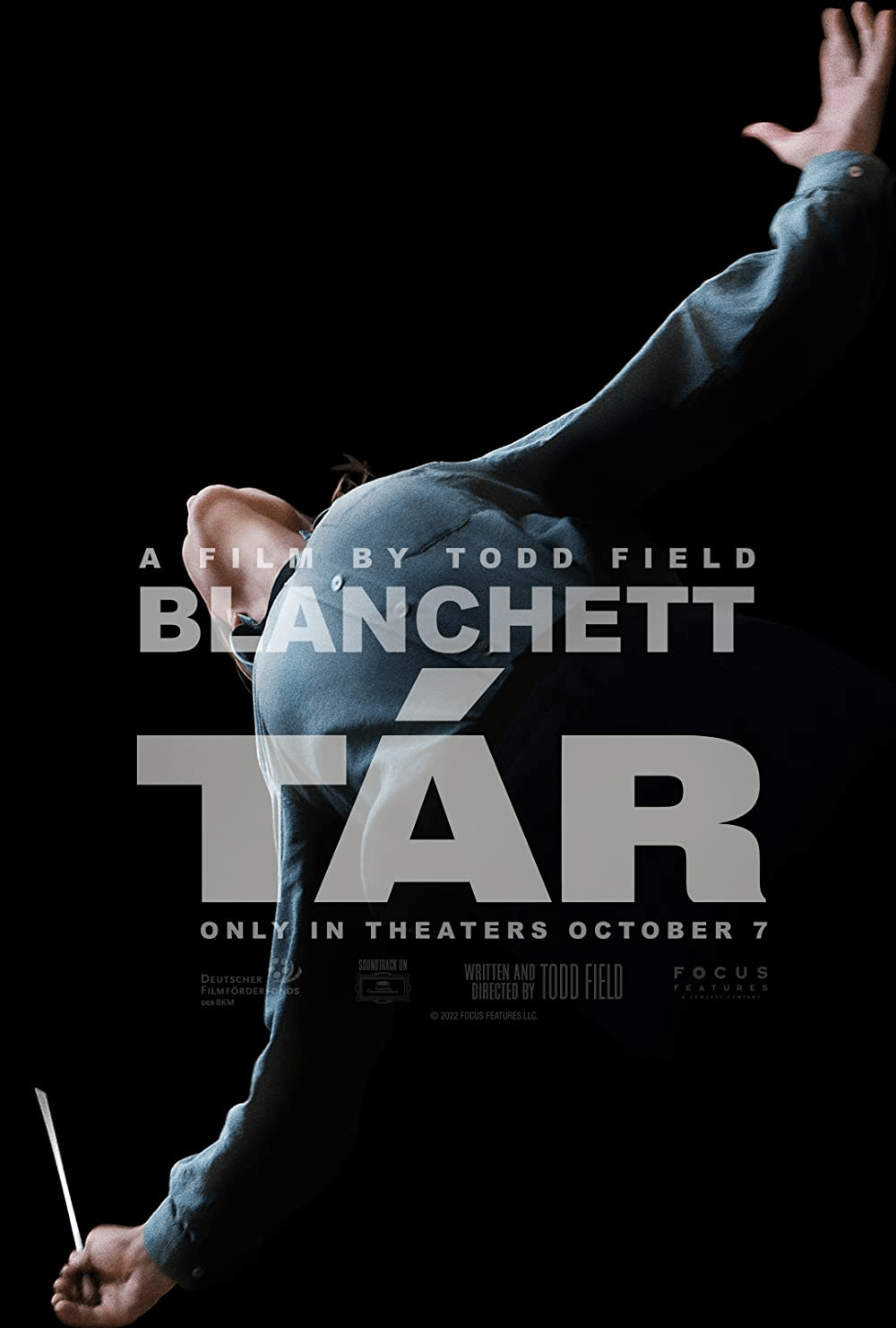 Movie poster for "TÁR" uses bold typography and dynamic imagery to create an instantly eye-catching design.