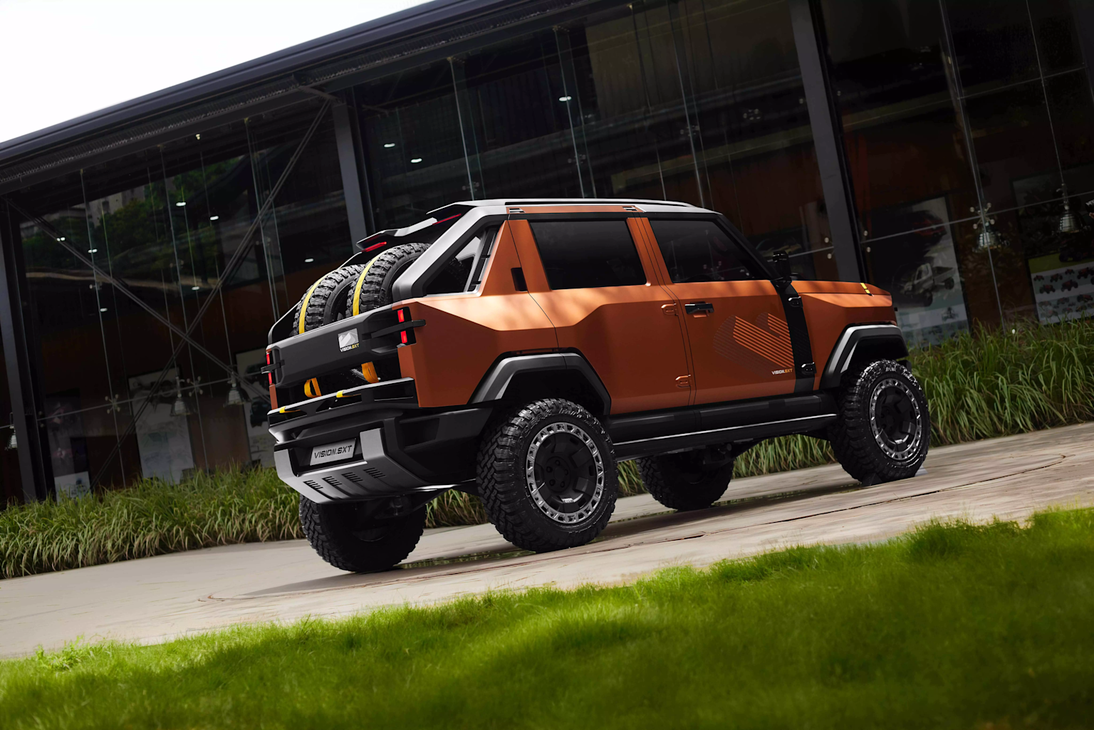 Mahindra Vision SXT electric SUV concept on NU.IQ platform showcasing rugged design and off-road capabilities