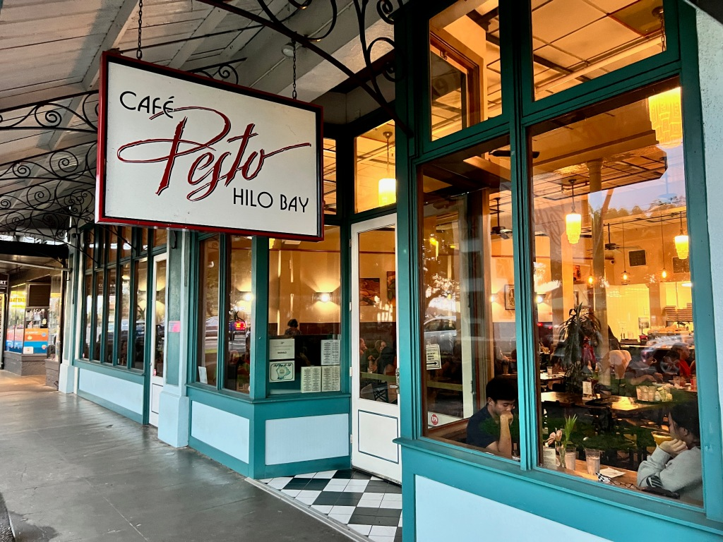 Exterior view of Café Pesto Hilo Bay showcasing inviting ambiance and local charm in Hilo, Hawaii