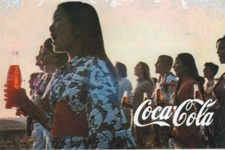 Coca-Cola's 1971 Hilltop campaign portrayed multicultural unity through young people sharing Coca-Cola bottles outdoors, symbolizing harmony and global togetherness