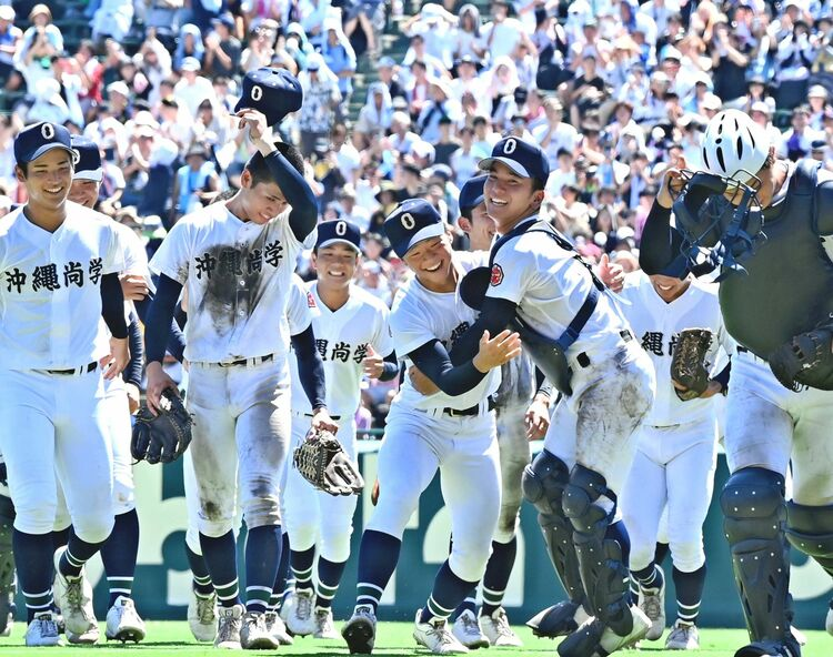 Okinawa Shogaku High School baseball players celebrate their 2025 Koshien championship victory with enthusiasm on the field