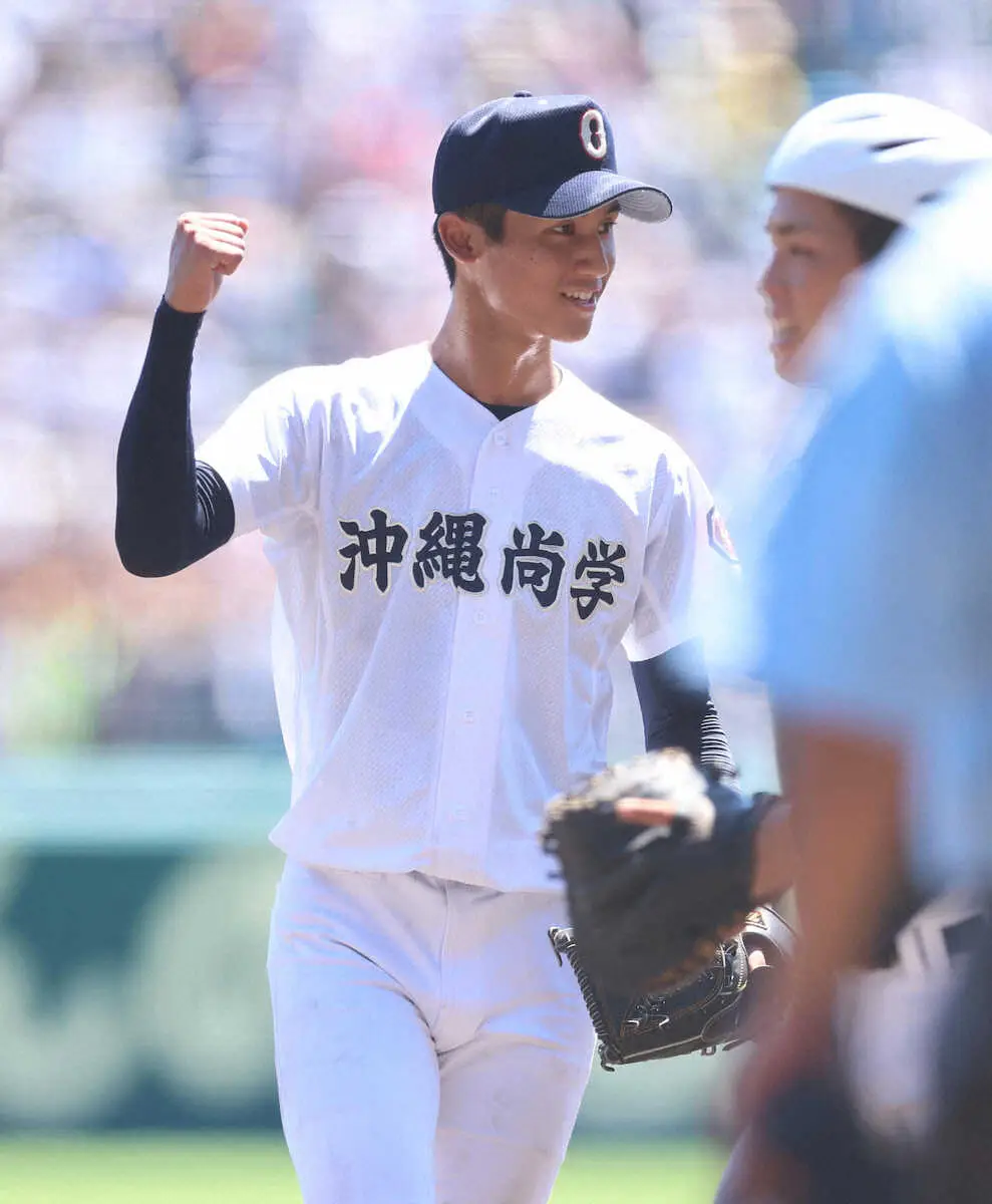Okinawa Shogaku baseball player celebrates during Koshien tournament match