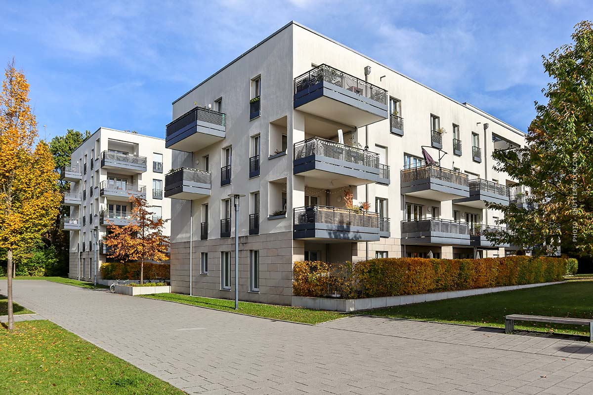 Modern multi-family residential building in Germany representing a typical capital investment property