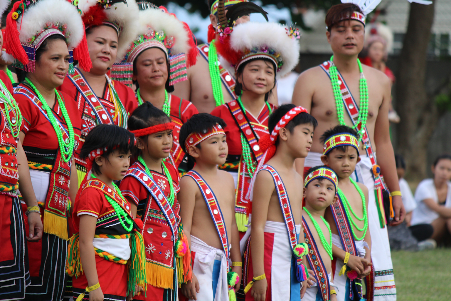 Group of Amis tribe members wearing traditional clothing during a cultural festival in Taiwan