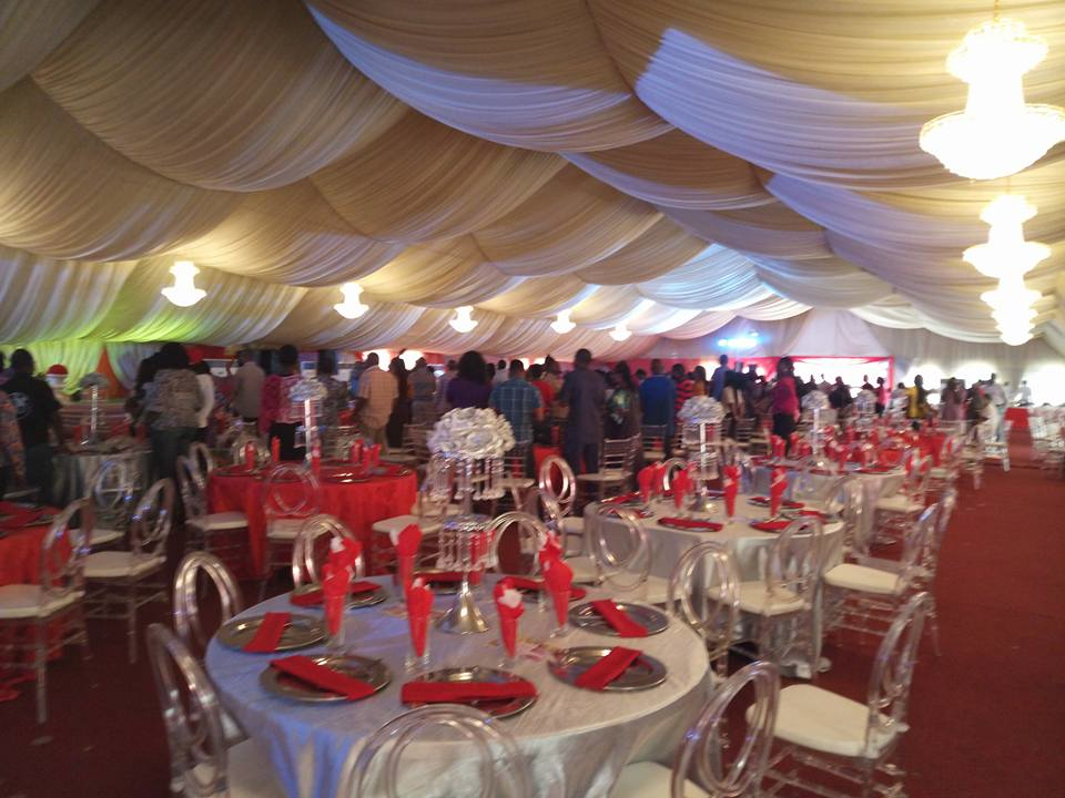 Yard 158 event venue in Ikeja decorated for a formal gathering with round tables and attendees