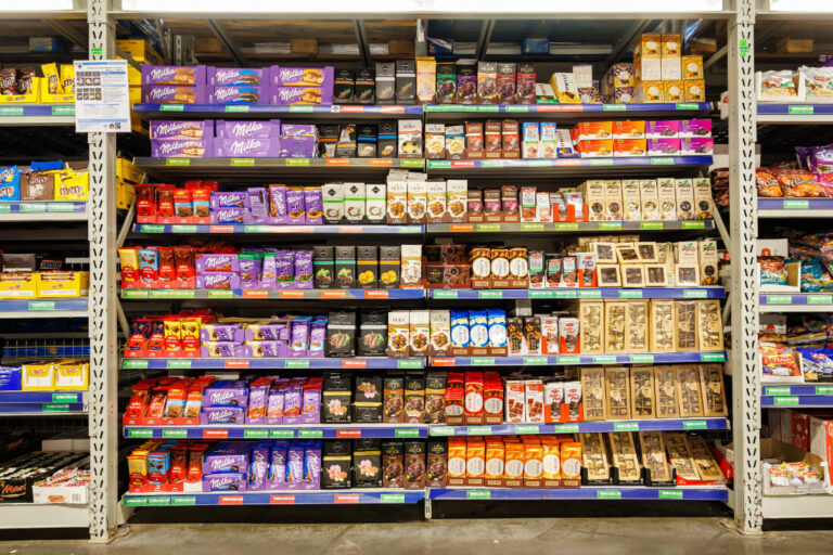 Colorful chocolate packaging on a store shelf demonstrating the use of contrasting colors to enhance product visibility and shelf impact.
