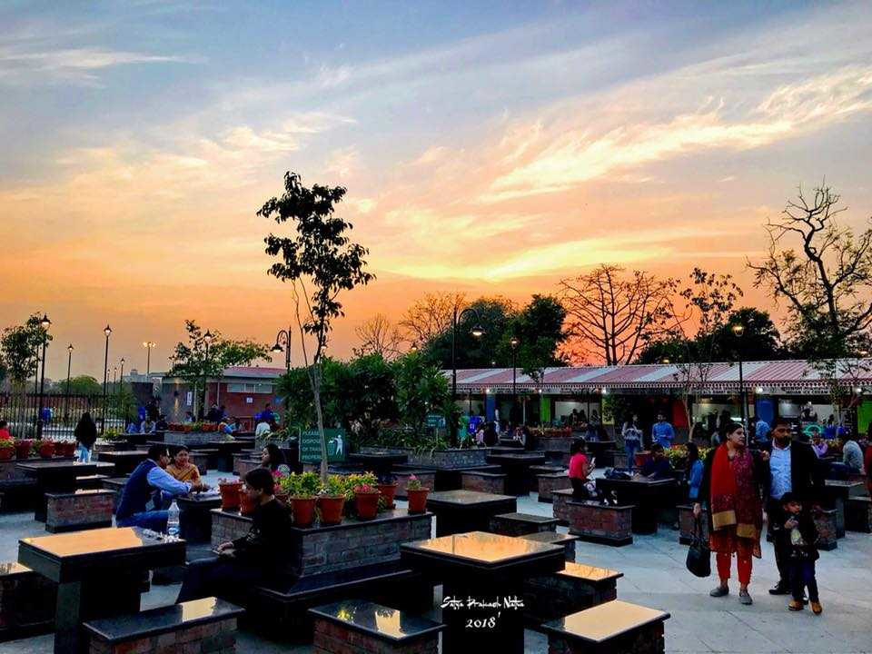 Masala Chowk street food court in Jaipur during sunset with vibrant seating areas and food stalls