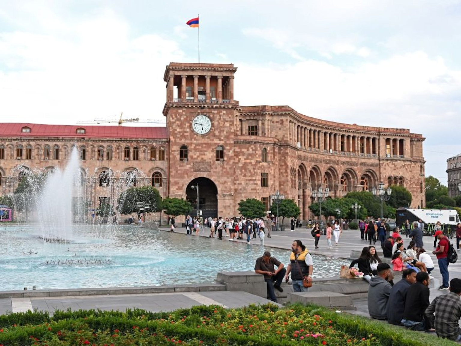 Republic Square in Yerevan, Armenia, showcases the city's famous pink stone architecture with a lively fountain and public plaza