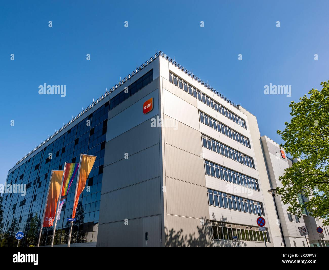 Modern GSK pharmaceutical company headquarters building shown from outside on a clear day