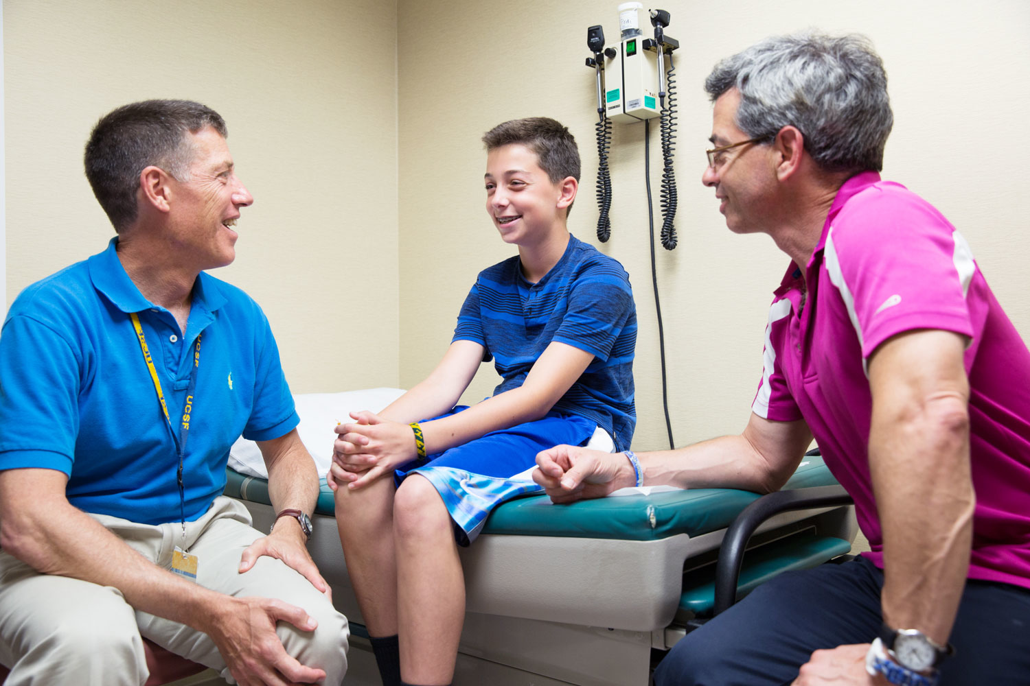 A clinical consultation involving a transgender youth at a gender clinic, highlighting supportive healthcare engagement