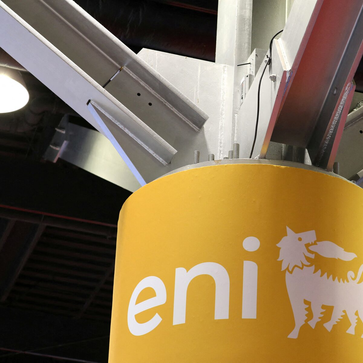 Eni company logo displayed on a structural pillar within an industrial facility