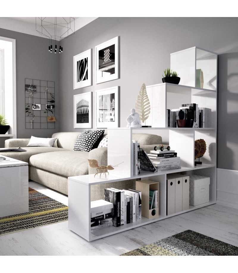 White glossy shelving unit used as a room divider to separate living spaces without construction work