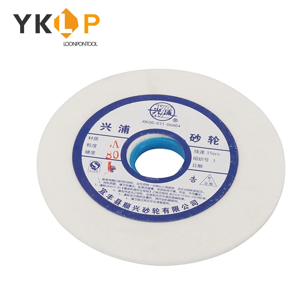 Ceramic grinding wheel with blue label and Chinese text for industrial abrasive use
