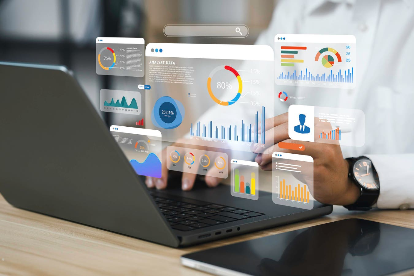 A small business owner using AIpowered data analytics tools on a laptop to boost productivity and growth