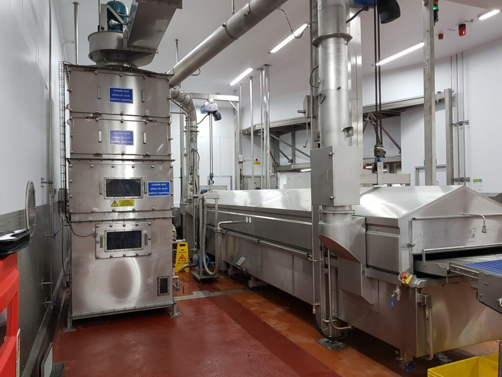 Industrial odour control system integrated in a food processing plant to manage and reduce odours