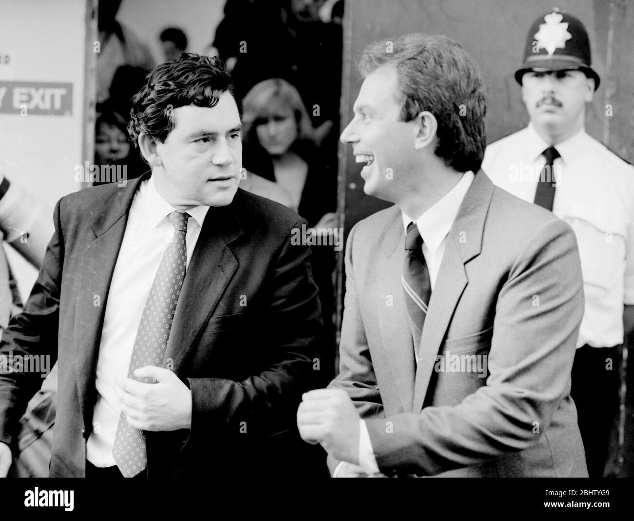 Tony Blair and Gordon Brown engaged in conversation during the early 1990s, key figures in the rise of New Labour and London's political-economic prominence