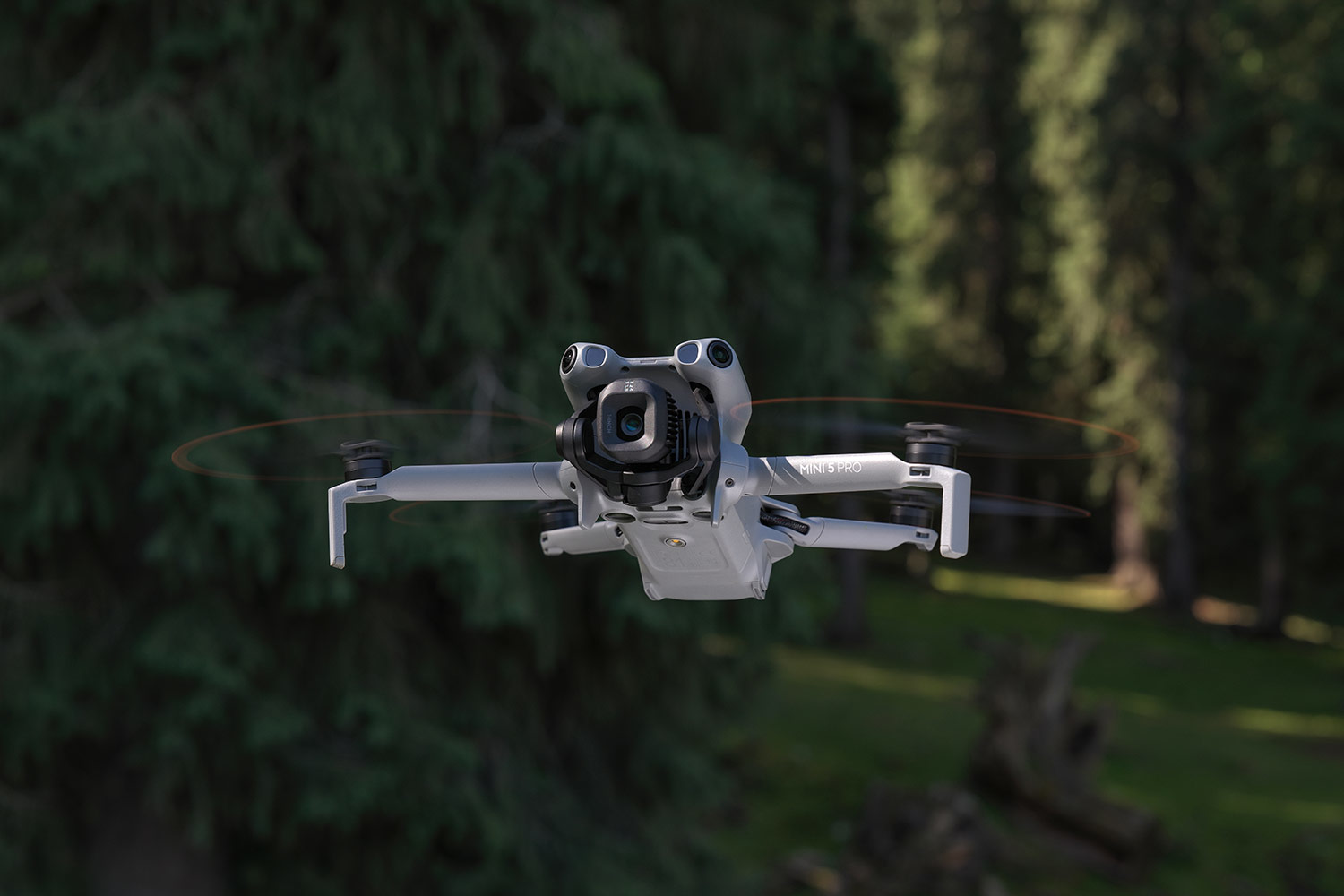 DJI Mini 5 Pro drone in flight with clear focus on its camera and design