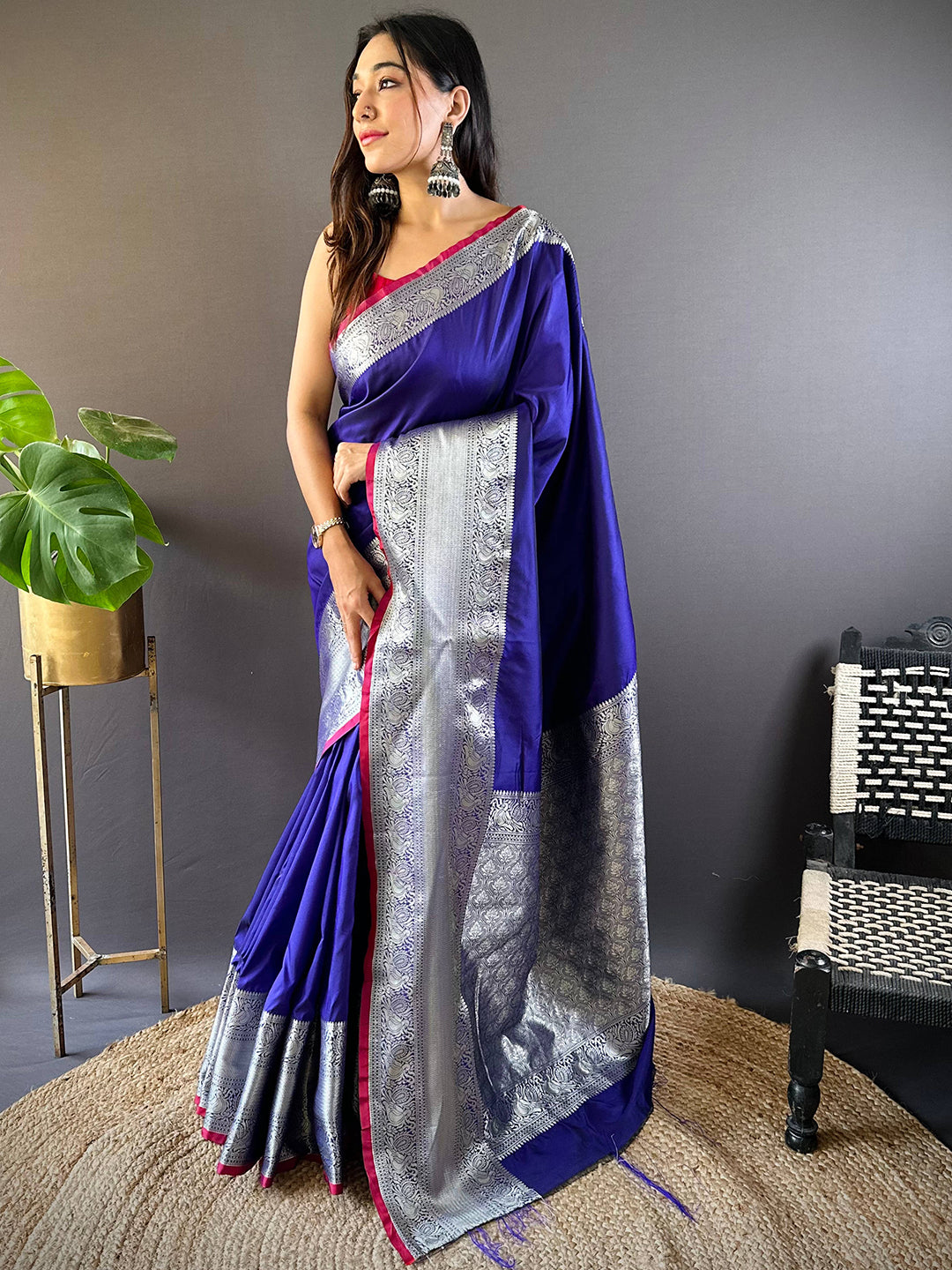 Royal blue saree with silver zari work and traditional jewelry showcases Bathukamma 2025 festive dressing style