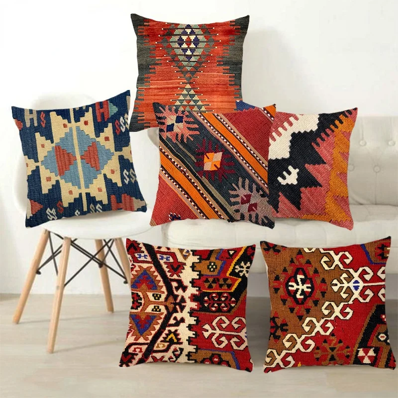 Decorative bohemian-style pillows with warm geometric patterns to enhance autumn home décor