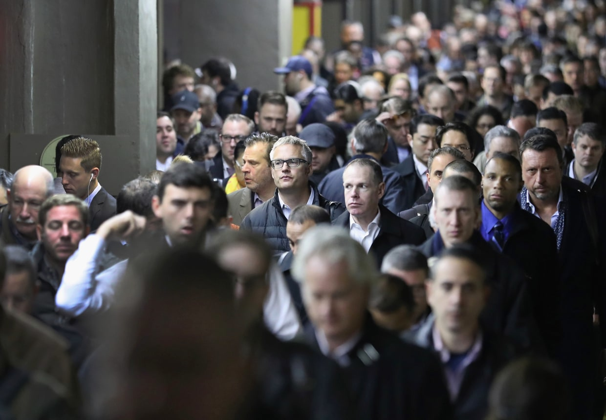 Crowd of people with pixelated faces representing privacy issues in facial recognition surveillance.