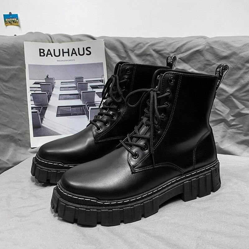 Black men's chunky leather ankle boots perfect for winter fashion and protection.