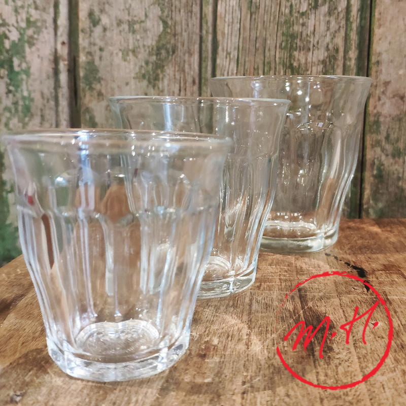 Set of three clear Duralex Picardie glass tumblers showcasing their classic fluted design